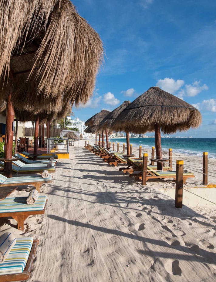 palapas-lounges-on-beach-cancun